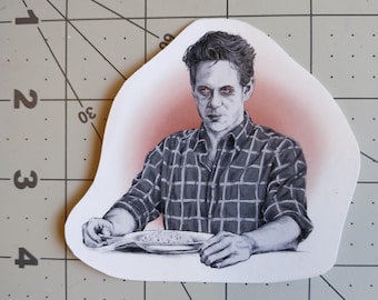 Peut inclure: Une illustration en noir et blanc d'un homme en chemise à carreaux assis à une table avec une assiette de nourriture. L'homme a une expression sérieuse sur son visage et regarde la nourriture.