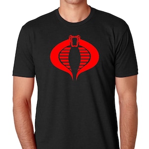 May include: A black t-shirt with a red Cobra logo from the G.I. Joe cartoon series.