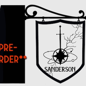 May include: Black and white pre-order sign with a sword and compass design. The sign reads "Sanderson".