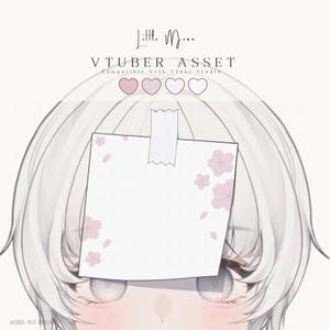 May include: Digital illustration of an anime-style character with white hair and large eyes. A white sticky note with pink cherry blossom designs is taped to the forehead. The text "VTUBER ASSET" is visible.