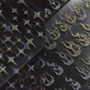 Nagelaufkleber / Nagelaufkleber - 3D gold / silber Glitzer Sterne und Feuer - 4 verschiedene Stile zur Auswahl