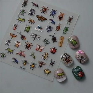 May include: A sheet of colorful insect stickers with a variety of designs, including butterflies, ladybugs, spiders, and ants. The sheet is labeled "Insects" and has the product code "TS-167".