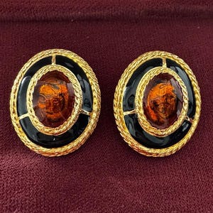 Elegant Gold and Black Enamel Clip-On Earrings