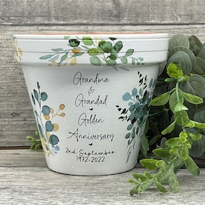 Golden anniversary plant pot gift. Personalised, name, date. Green gold eucalyptus design. Wedding, Birthday, Teacher, Housewarming.