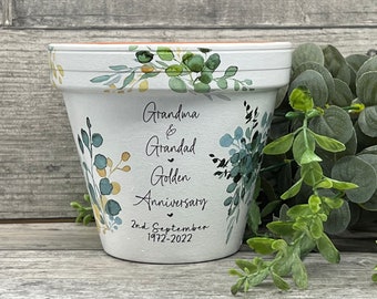 Golden anniversary plant pot gift. Personalised, name, date. Green gold eucalyptus design. Wedding, Birthday, Teacher, Housewarming.
