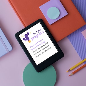 May include: A digital e-reader displaying a motivational quote with a purple cactus graphic. The text reads "purple progress. This is work that is growing beautifully! These are areas that you have worked hard to grow and develop!"