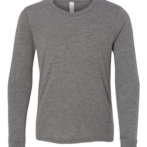 May include: A heather grey long-sleeve t-shirt with a crew neck.