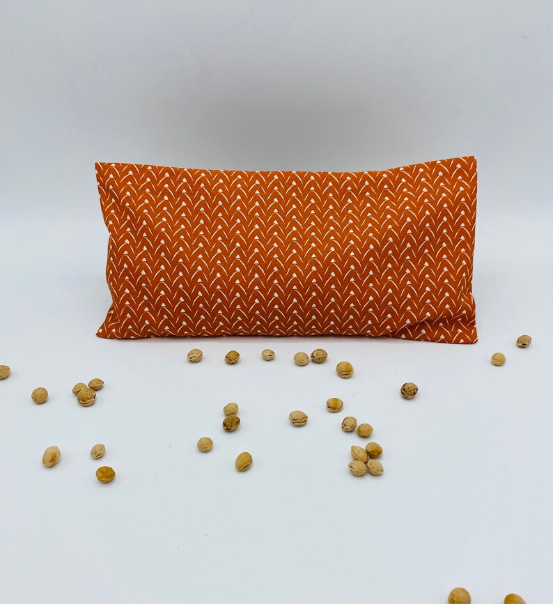 Bouillotte sèche déhoussable au noyaux de cerise 45 Géométrie orange