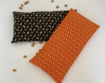 Dry hot water bottle with removable cherry stone cover