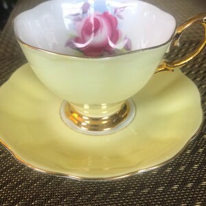 Vintage pretty yellow ground, Royal Albert “Painters Rose” bone china cup and saucer.circa 1960’s