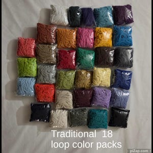 May include: A collection of thirty-five square plastic bags containing colorful fabric loops in various shades including red, blue, green, yellow, purple, and neutral tones, with the text Traditional 18 loop color packs.