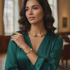 Conjunto de collar y pulsera con cabeza de carnero chapado en oro