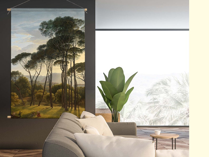 May include: A tapestry featuring a landscape painting of a grove of trees with a cloudy sky in the background. The trees are tall and slender with green leaves. The sky is a light blue with white clouds. The painting is framed in a wooden frame.