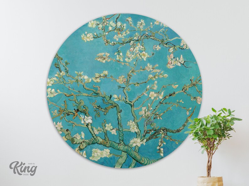May include: A round wall decoration featuring a painting of a blossoming almond tree with white flowers against a blue background. The painting is in the style of Vincent van Gogh.