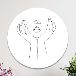 Wall circle for hanging | Line art of black lines on a white background representing a thinking woman | Round artwork on the wall