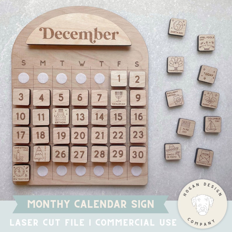May include: A wooden calendar sign with the word "December" at the top. The calendar has a grid of 30 squares, each with a number from 1 to 30. There are also small wooden squares with various holiday icons and names, such as "Earth Day", "Thanksgiving", and "Christmas Eve".