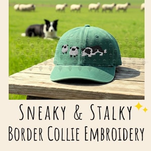 May include: A sage green baseball cap featuring embroidered details of two small white sheep and a black and white border collie in a crouching position. The cap has a structured crown, a curved brim, and eyelets for ventilation on the top panels.