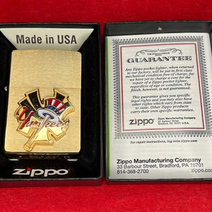 File:Vintage Zippo Fish Cigarette Lighter, NIB (9762855995).jpg