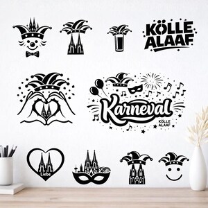 Könnte beinhalten: Schwarz-weiße Wandaufkleber mit Karnevalsmotiven, darunter ein Narrenhut, der Kölner Dom und der Schriftzug "Kölle Alaaf". Weitere Designs zeigen ein Herz, eine Maske und Noten.
