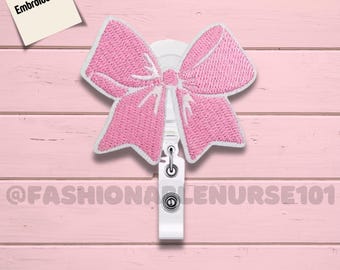 Geborduurde badgehaspel met roze strik, schattige ID-houder