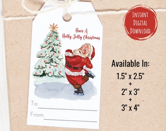May include: A white Christmas gift tag with a watercolor illustration of Santa Claus ice skating next to a decorated Christmas tree. The tag reads "Have A Holly Jolly Christmas" and is available in 1.5" x 2.5", 2" x 3", and 3" x 4" sizes.
