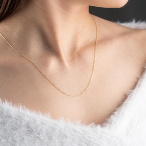 Kabelkedja i 14 karat massivt guld: Elegant 1 mm bredd