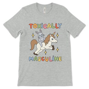 Funny graphic tee featuring the phrase "Toxically Masculine," delivering an ironic and satirical take on toxic masculinity.