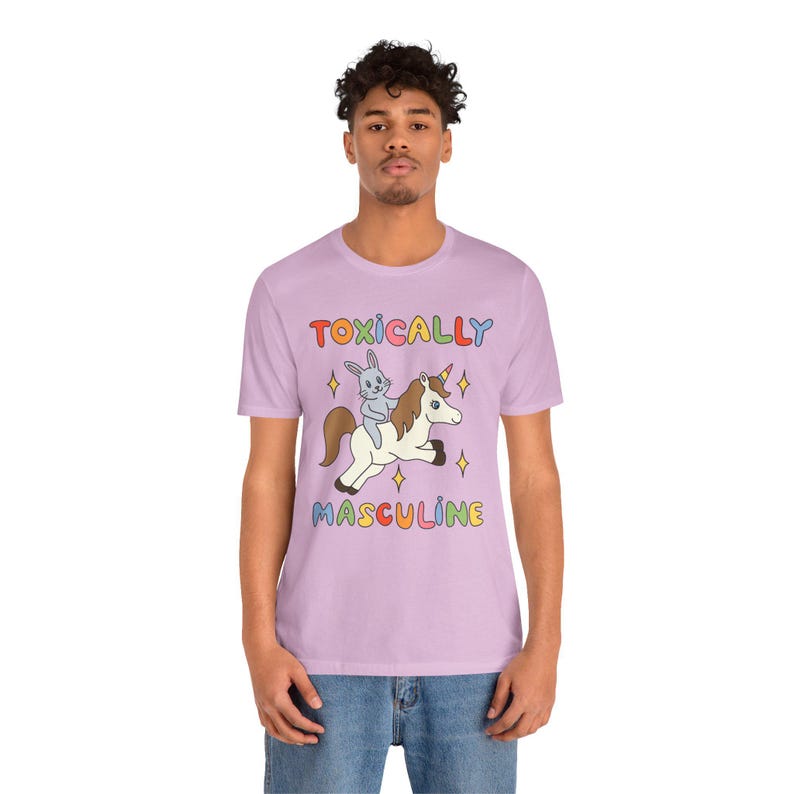 Funny graphic tee featuring the phrase "Toxically Masculine," delivering an ironic and satirical take on toxic masculinity.