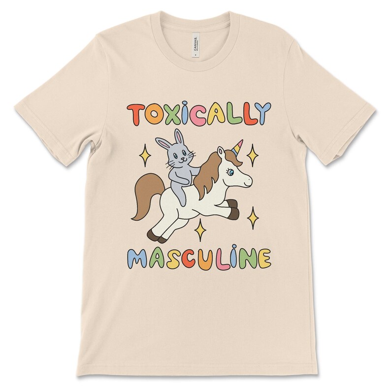 Funny graphic tee featuring the phrase "Toxically Masculine," delivering an ironic and satirical take on toxic masculinity.