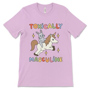 Funny graphic tee featuring the phrase "Toxically Masculine," delivering an ironic and satirical take on toxic masculinity.