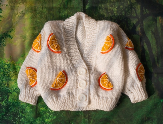 Orange baby sweater discount