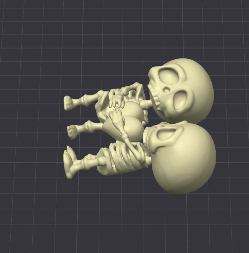 May include: Two small, white, cartoon skeletons are hugging each other. The skeletons are lying on their sides with their heads facing the same direction. The skeletons have large, round eyes and small, black mouths.