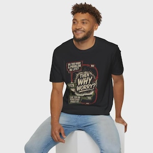 May include: Black t-shirt with a graphic that reads "Do you have a problem in life? Then why worry?" in white and red text. The shirt has a crew neck and short sleeves.