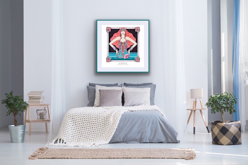 May include: A framed illustration of a woman with red hair and a blue and pink outfit. The woman is standing in front of a blue and white wave. The frame is teal and the text "Scorpio" is at the bottom of the image.