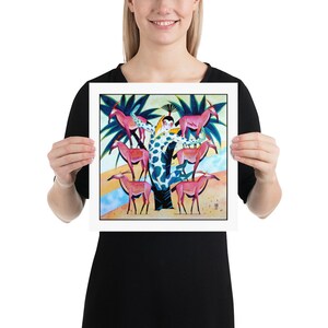 May include: A colorful painting of a woman standing in a tree with five pink antelopes surrounding her. The woman is wearing a spotted blue and white dress and has a black and white headdress. The background is a blue and white landscape.