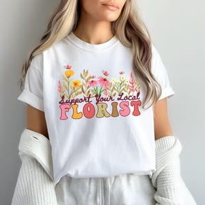 Bloemist grafisch T-shirt steun je lokale bloemist Shirt bloemenwinkel shirt schattig bloemenshirt retro plantenliefhebber cadeau Botanical Boutique T-shirt