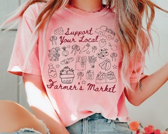 Unterstützen Sie Ihr lokales Bauernmarkt-Shirt Essen Sie ein lokales Grafik-T-Stück Lustiges Landmädchen Bauernhof-Hemd Bauernhofleben-Geschenk Massen-Boutique B2B T-Shirt