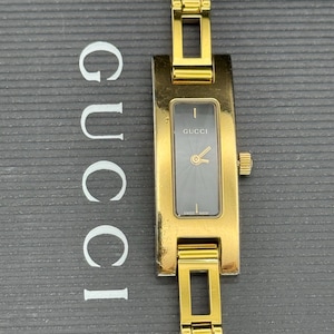 Vintage authentiek Gucci-polshorloge verguld roestvrij staal Zwitserse makelij Niet bekrast Gecontroleerd onderhouden Zwitserland Perfecte staat
