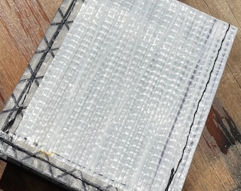 Cartera de lona plegable reutilizada y remanente