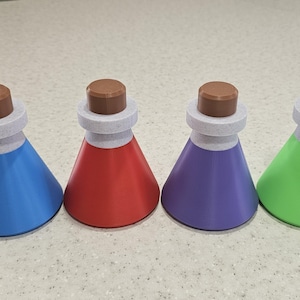 Potion bottle shaped stash jar.  Dice storage, cosplay prop