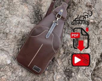 May include: A brown leather crossbody bag with a strap and a metal clasp. The bag is sitting on a tree trunk. The image also includes a logo for Goatro, a PDF download icon, and a YouTube video icon.