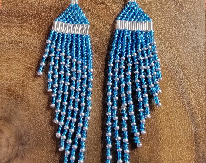 Dazzling, Lt.  Blue and Silver, handmade, beaded, small wing shaped, 4" long fringed dangle earrings for pierced ears by Be Dazzled Earrings
