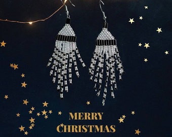 Elegant, Sparkling 3" long, multi-length, 9 strand, Crystal and Black dangle earrings for pierced ears, perfect for any special occasion.