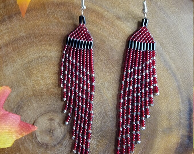 Elegant, handmade, beaded, 4.5" long, Deep Garnet, Silver and Black colored, Wing shaped, multi-length fringe earrings for pierced earrings.
