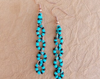 Turquoise and Black, handmade, beaded "Links of Love" earrings come in 3 lengths. each pair sold raises money for wigs for cancer patients.