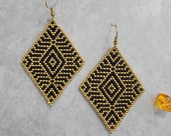 Elegant, diamond shaped, handmade, beaded, Black and Gold, dangle earrings, for pierced ears by Be Dazzled Earrings.