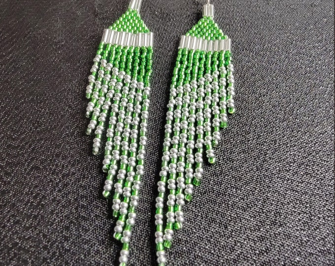 Get Sparkling Elegance with these Green and Silver, multi-length, 4" long, fringed, wing shaped, handmade, beaded earrings for pirced ears.