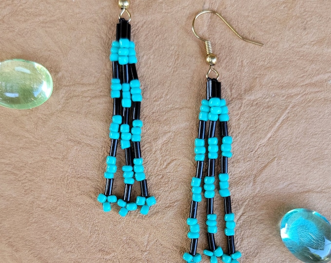 Turquoise and a variety of Gold, White, and Black, handmade, beaded, 3" long, medium length 3 strand dangle earrings for pierced ears.