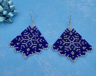 Sparkling, fan shaped, lacey looking, handmade, beaded, Bright Blue and Crystal snowflake, dangle holiday earrings by Be Dazzled Earrings.