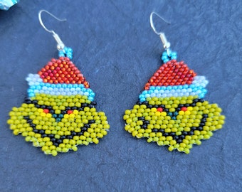 Calling all "Grinch" lovers.  Fun, handmade, beaded, Grinch face dangle earrings, by Be Dazzled Earrings perfect for your holiday outings